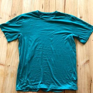 Nike dri-fit shirts.Three shirts in total.All size small.dark & light blue/green
